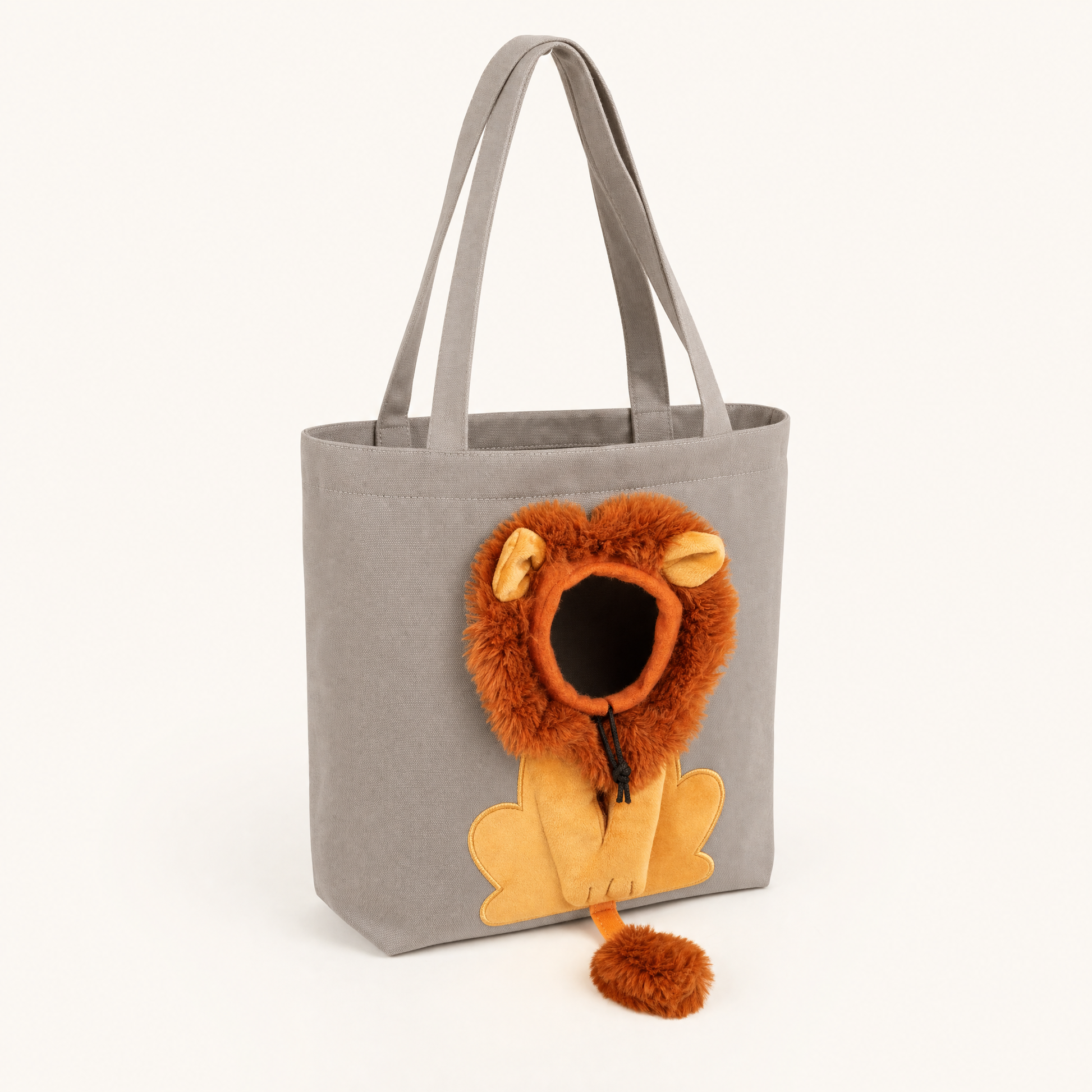 LittleManes Lion Tote in warm grey canvas, three-quarter view showing plush lion mane, ears, paws and tail