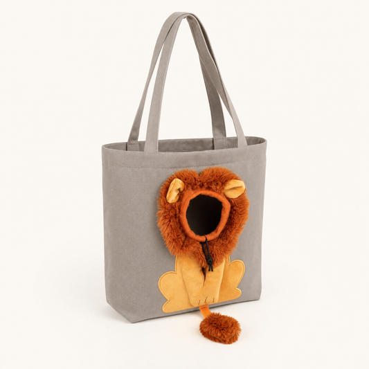 LittleManes Lion Tote in warm grey canvas, three-quarter view showing plush lion mane, ears, paws and tail