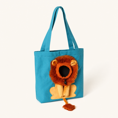 LittleManes Lion Tote in dusty blue canvas, side three-quarter view showing depth